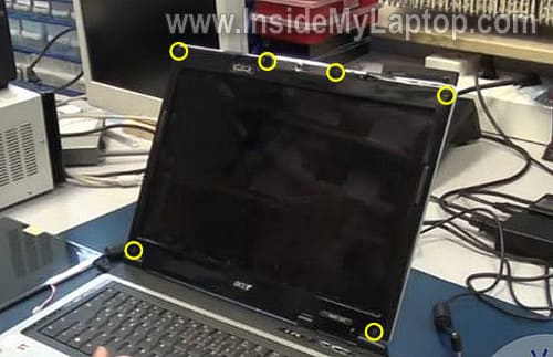 Remove screw from LCD bezel