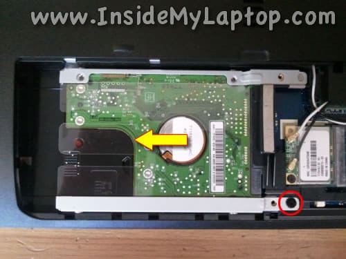 Remove one screw securing hard drive