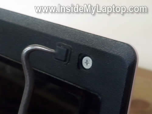 Remove top display screw