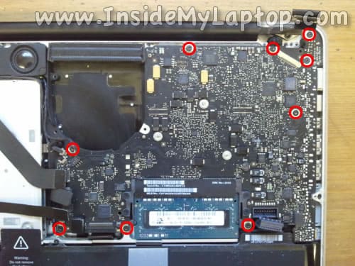 Remove screws securing motherboard