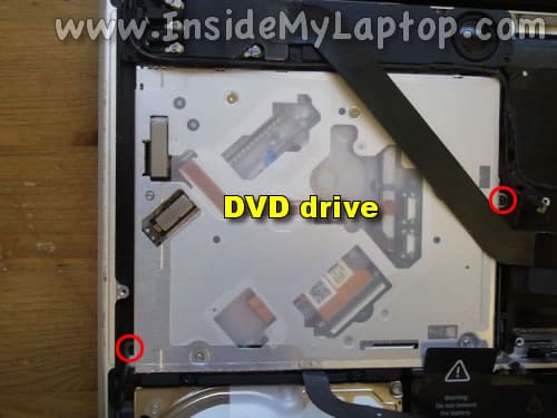 Remove two more DVD drive screws