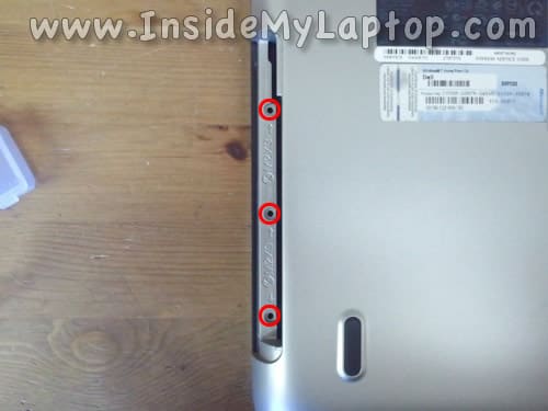 Remove three screws from DVD drive bay