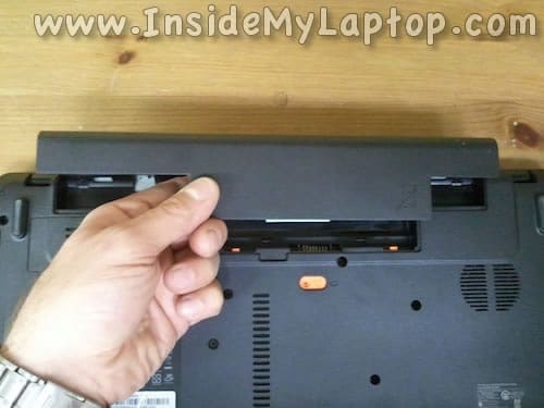 Unlock and remove laptop battery