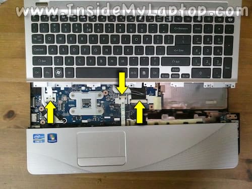 Disconnect keyboard and trackpad cables