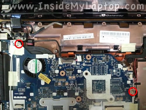 Remove two screws securing motherboard
