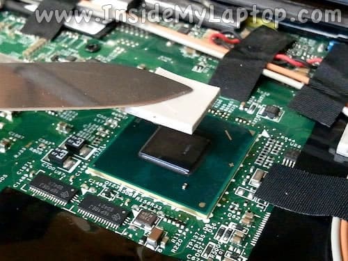 Place thermal pad on chip