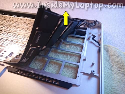 Start separating keyboard from top cover