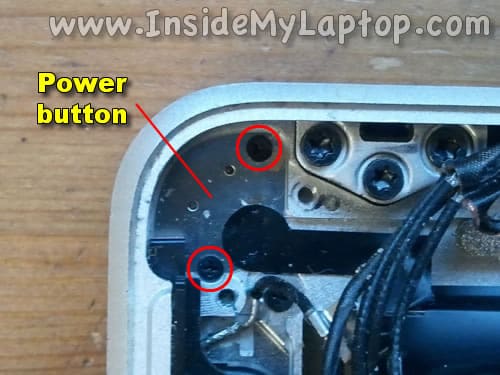 Remove two screws from power button