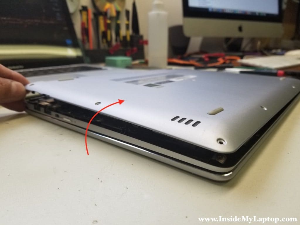 Separate bottom cover from laptop