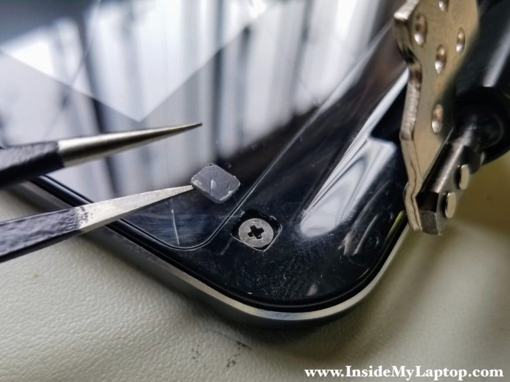 Remove screws securing screen bezel