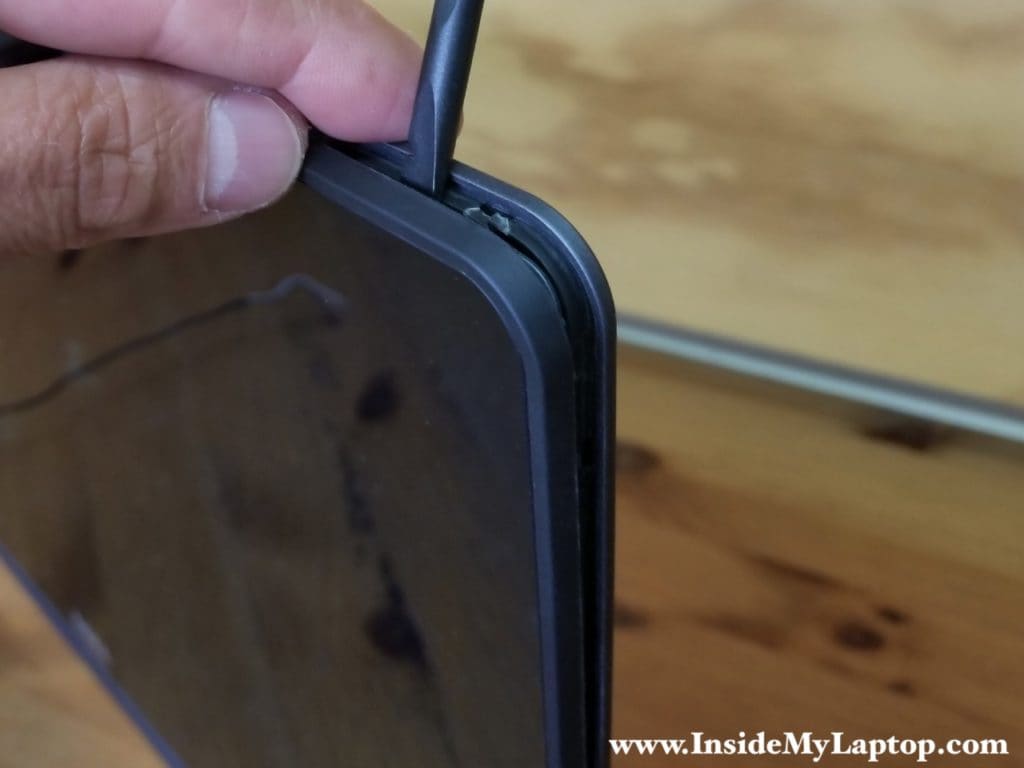 Start separating touch screen bezel from back cover