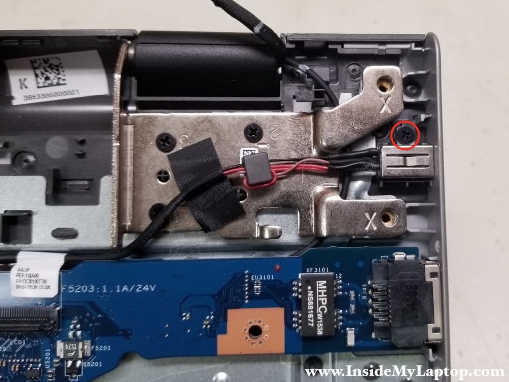 Remove screw securing DC power jack