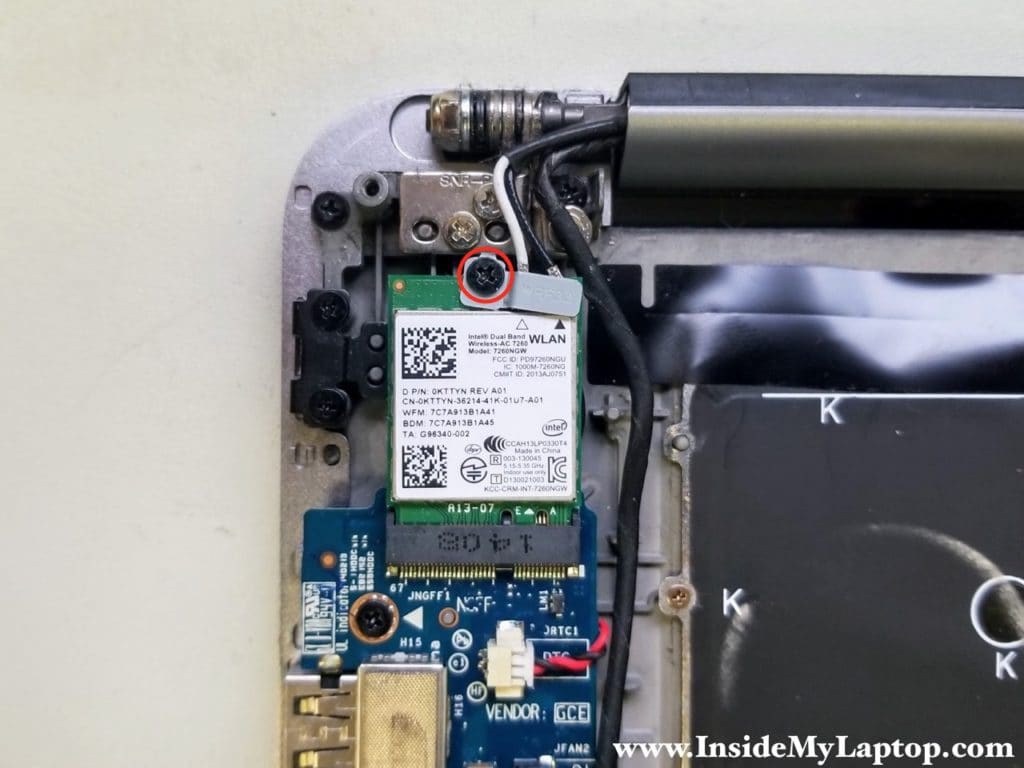 Remove WLAN card bracket and disconnect antenna cables