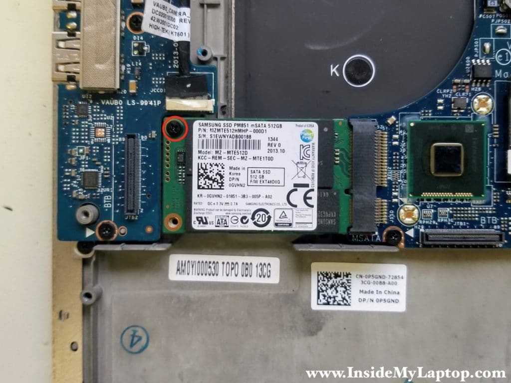 Remove one screw securing mSATA SSD drive