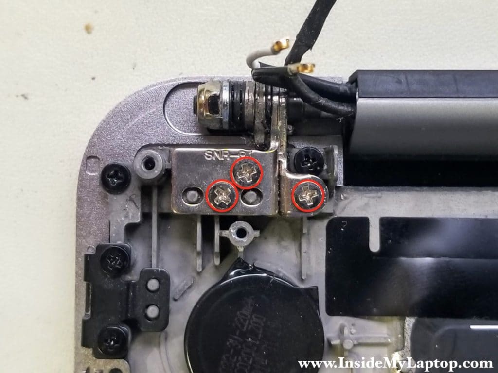 Remove three screws from right hinge