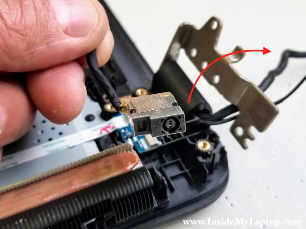 Open hinge and remove DC power jack