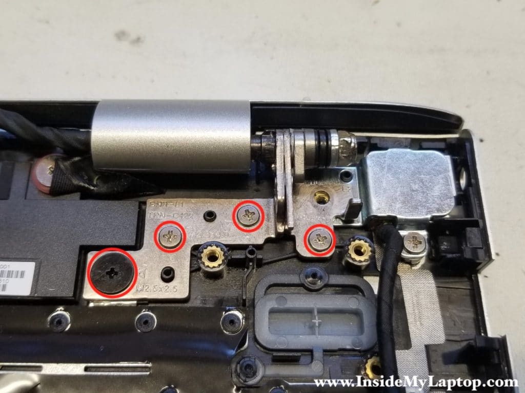 Remove screws securing left hinge