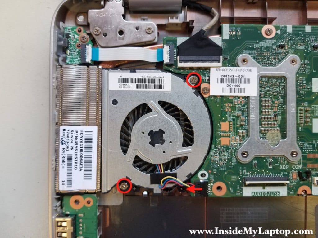 Remove two fan screws and disconnect fan cable