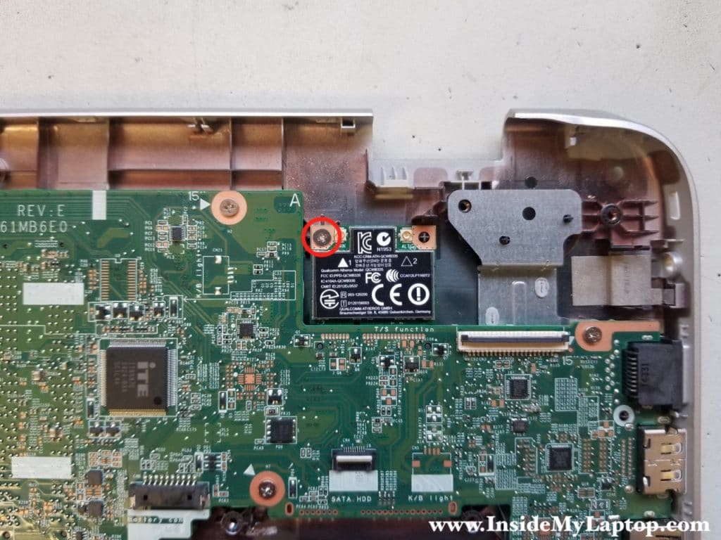 Remove wireless card screw