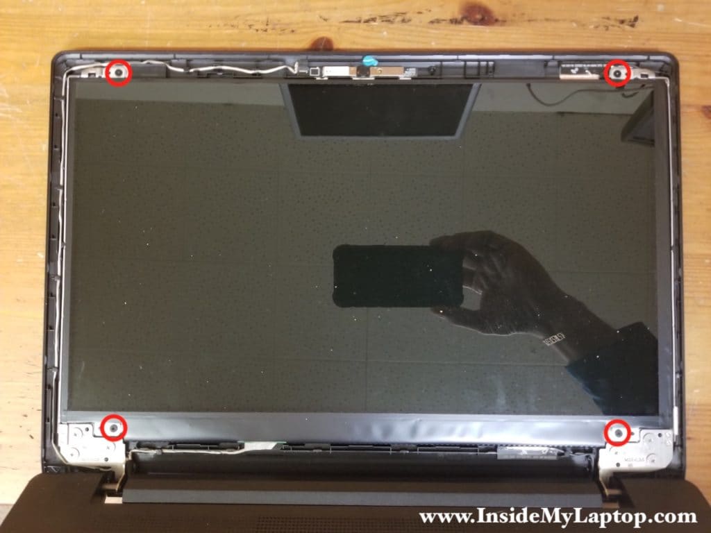 Remove screws securing LCD screen