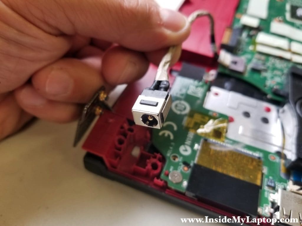 Disconnect DC power jack cable and remove it