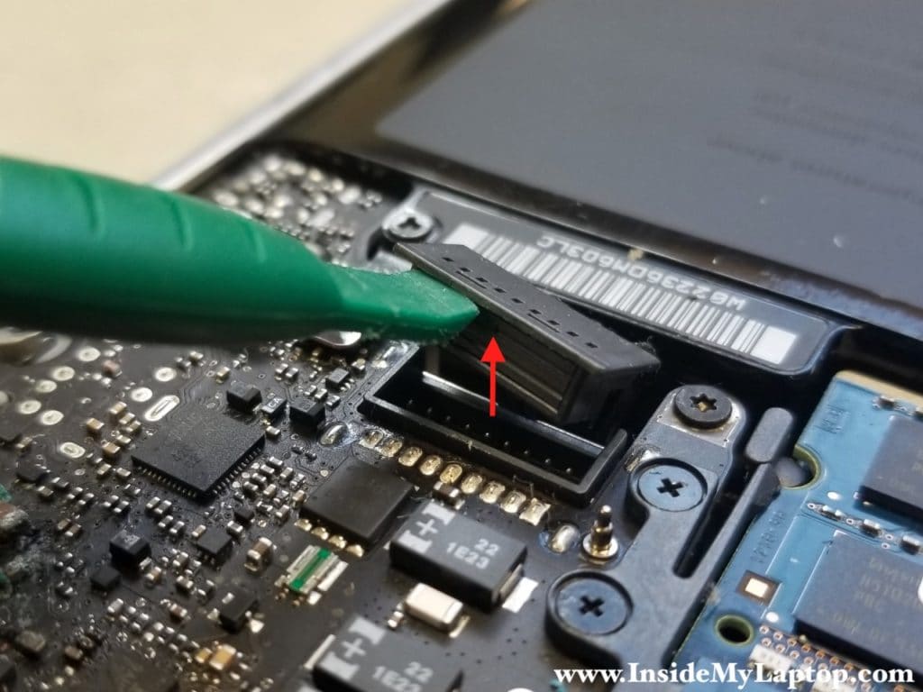 Disconnect battery cable from logic board