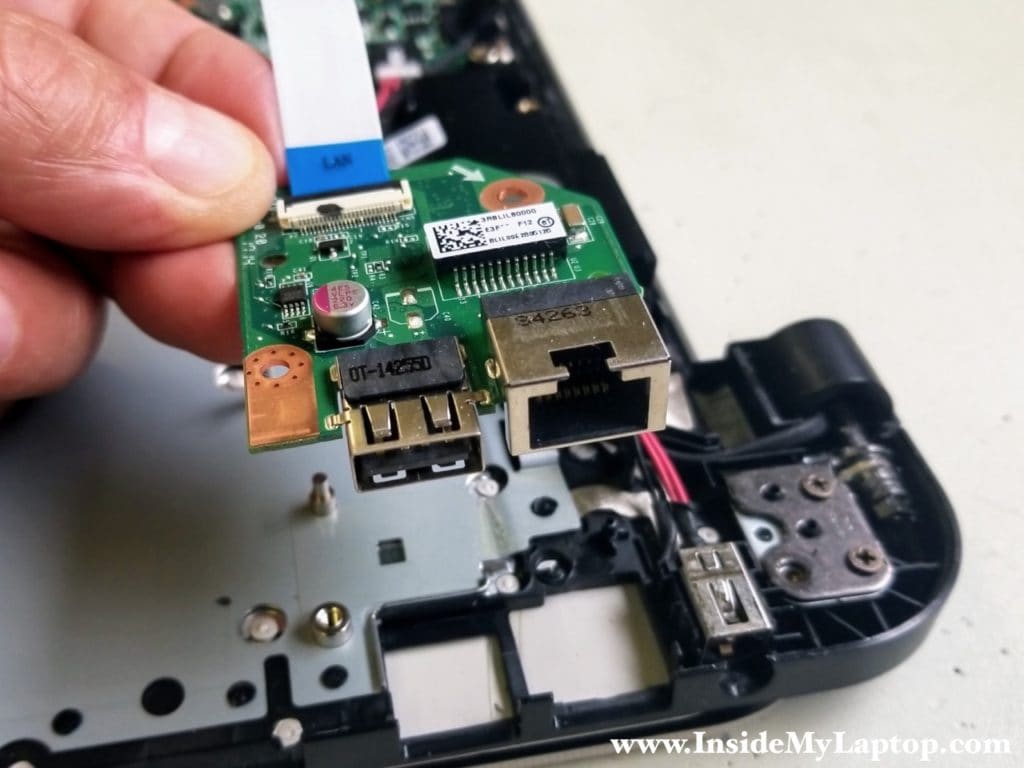 Remove USB LAN board with cable