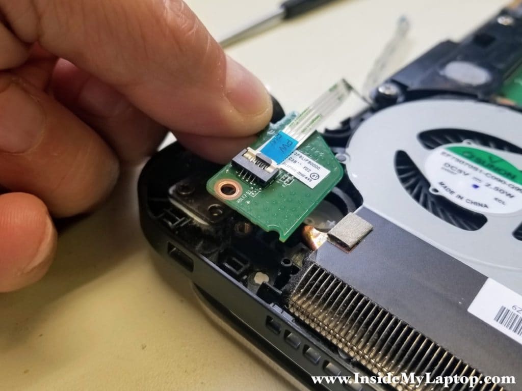 Remove power button board with cable