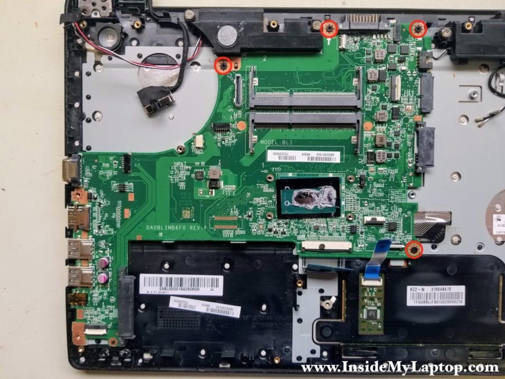 Remove four screws fastening motherboard