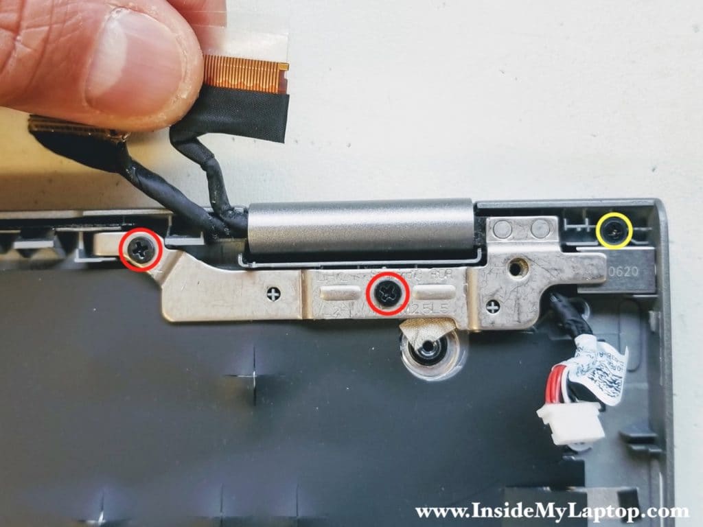 Remove screws from DC jack and hinge