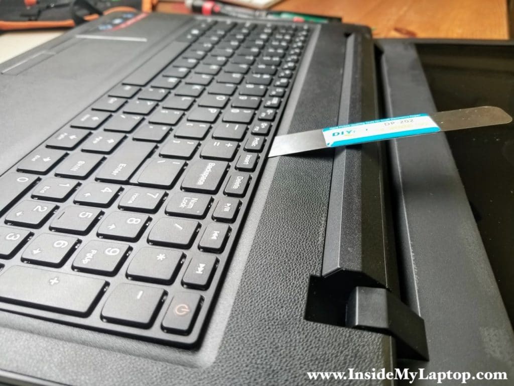 Continue separating keyboard from top case