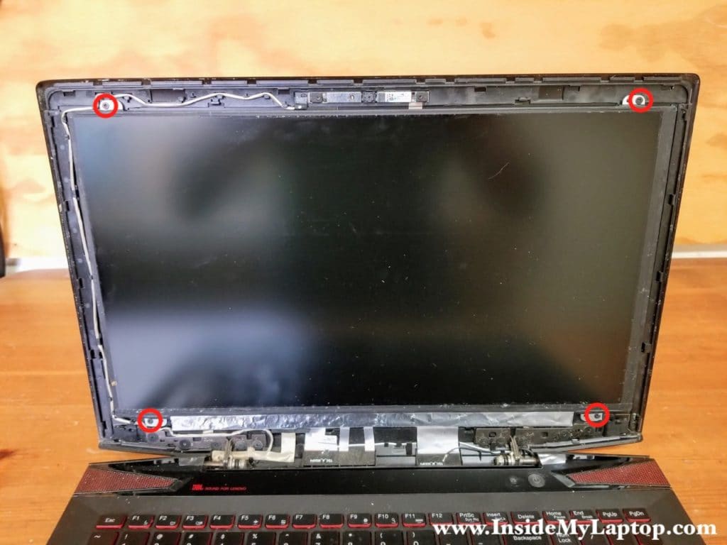 Remove four screws securing LCD screen