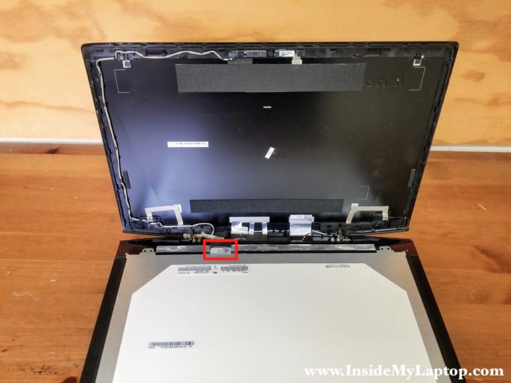 Access video cable connector on back of LCD