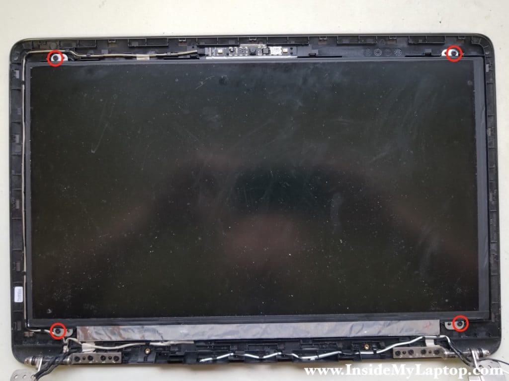 Remove four screws securing LCD screen