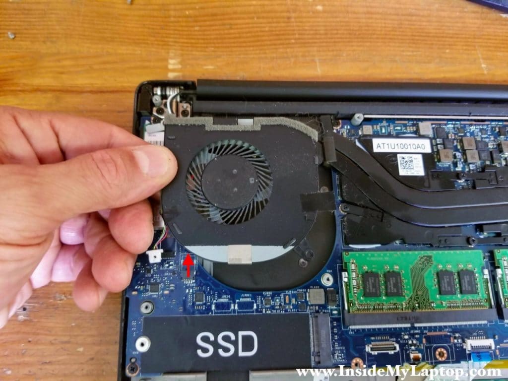 Remove the right cooling fan and disconnect it from the motherboard.