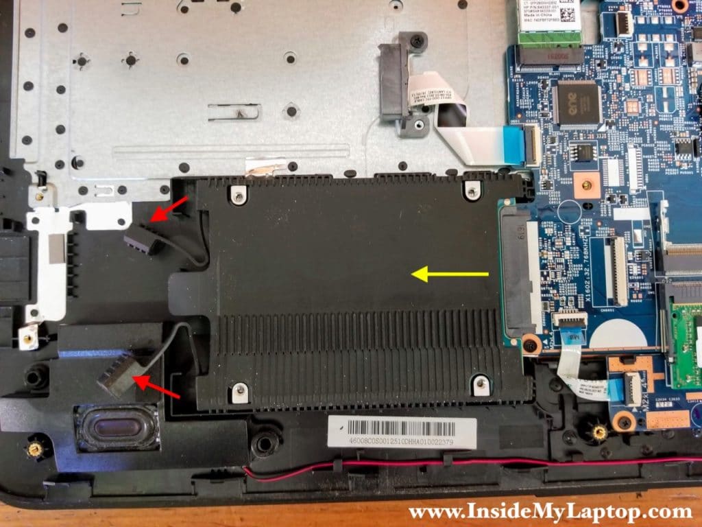 Slide the hard drive to the shown direction (yellow arrow) to disconnect it from the SATA port.