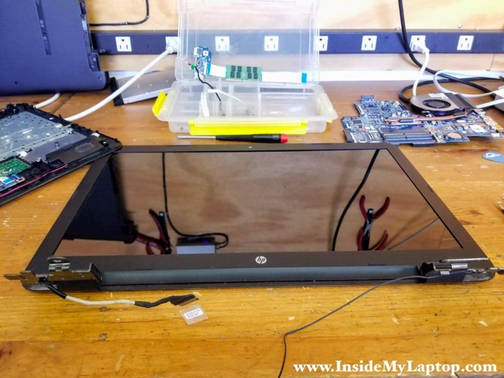 The display panel can be taken apart while still attached to the laptop base.