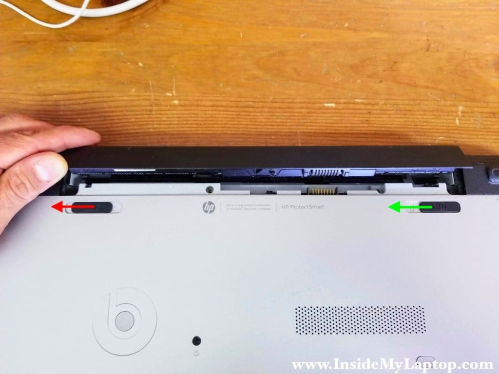 Unlock and remove laptop battery