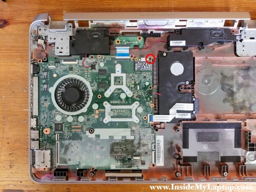 Remove one screw securing wireless card