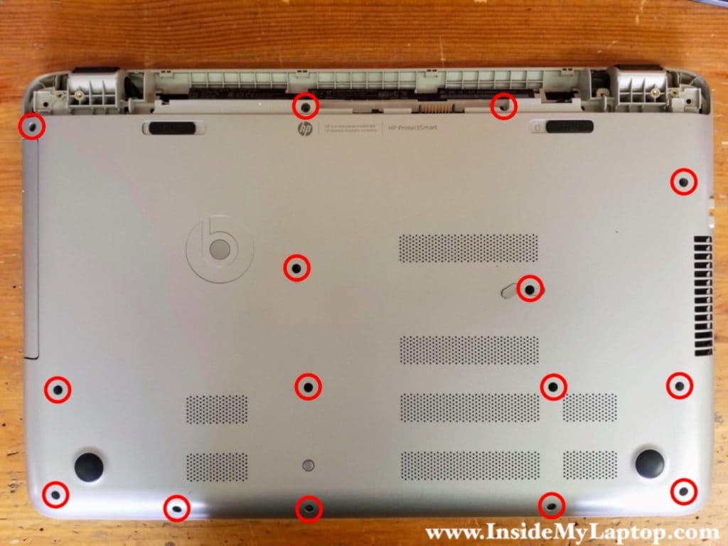 Remove screws from laptop bottom