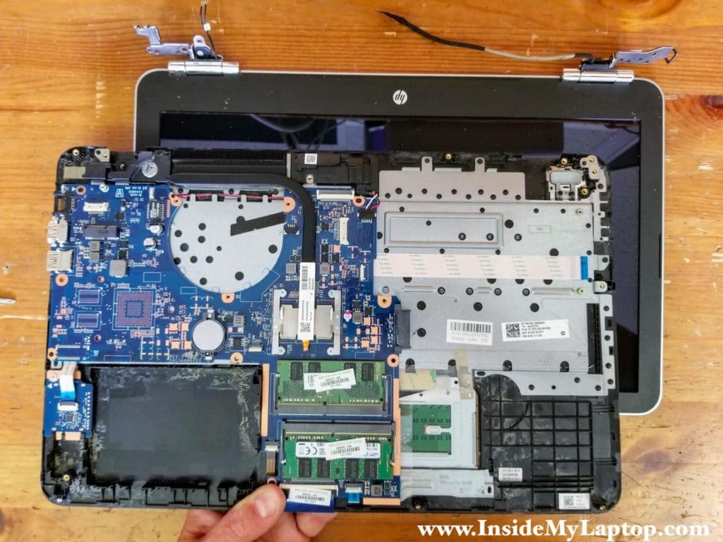 Separate the top case assembly from the display assembly.