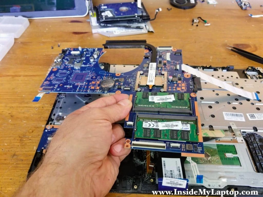 Remove the motherboard.