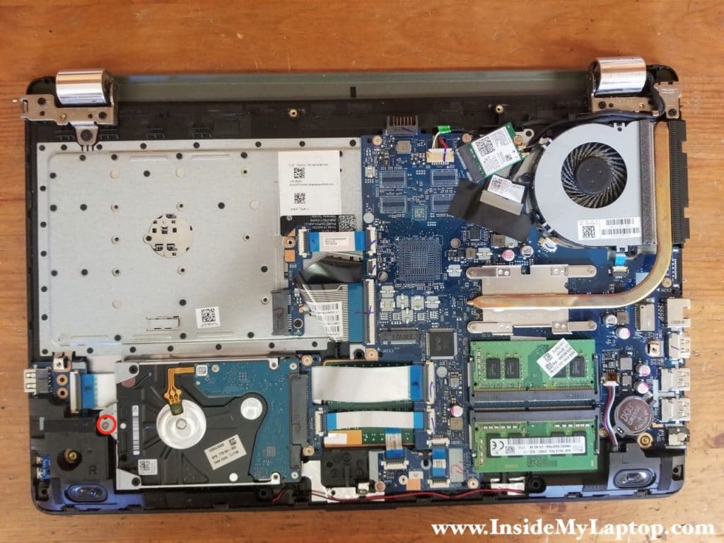 Remove one screw from hard drive caddy