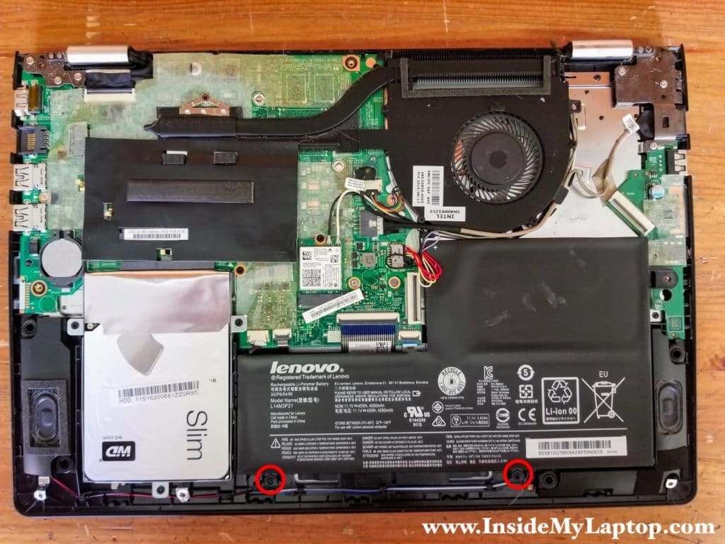 Remove two screw securing the main laptop battery.