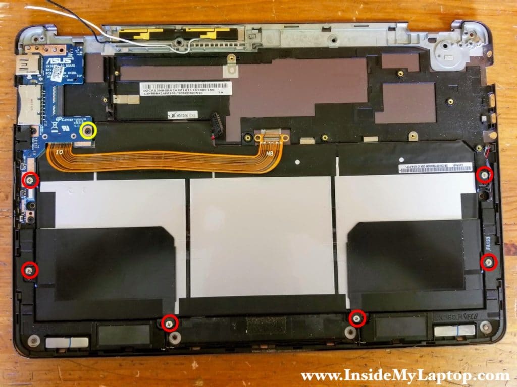 Remove six screws from the battery and one screw from the USB SD card reader board.