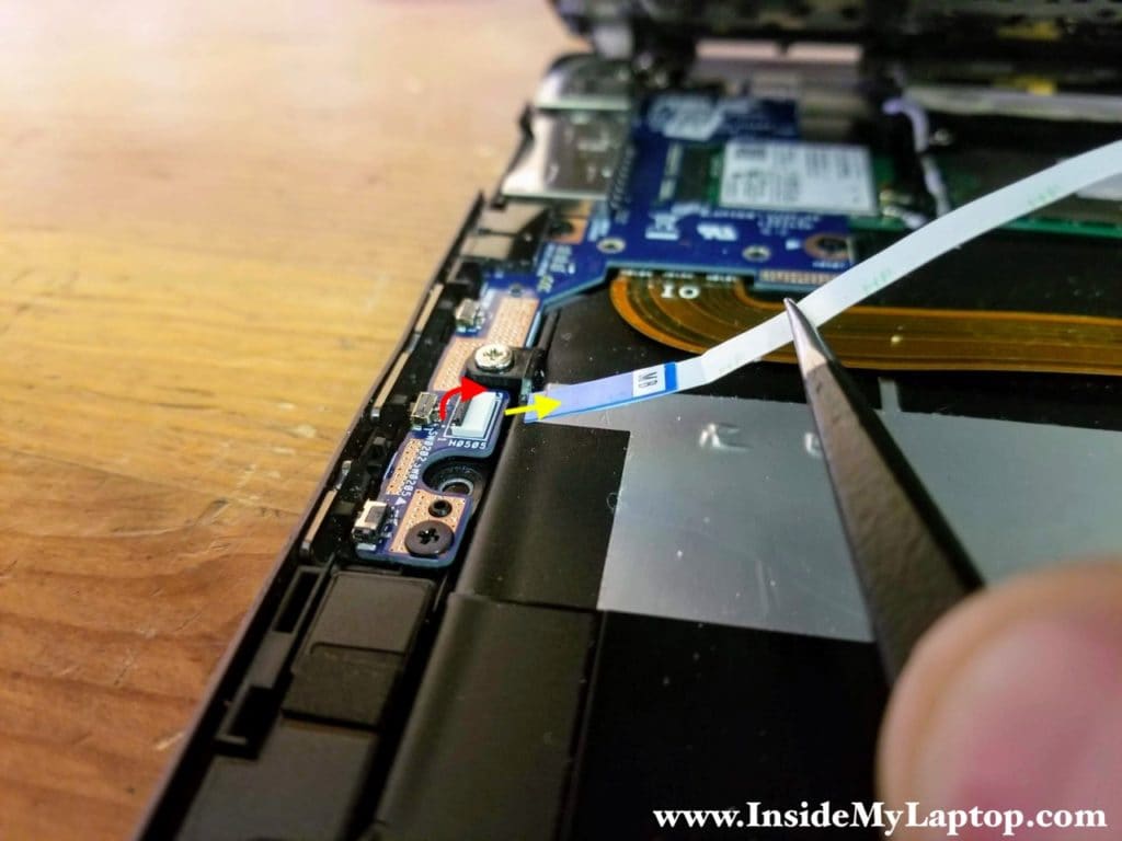 Here's how to disconnect the touchpac cable from the I/O board (USB port, SD card reader and power button board).