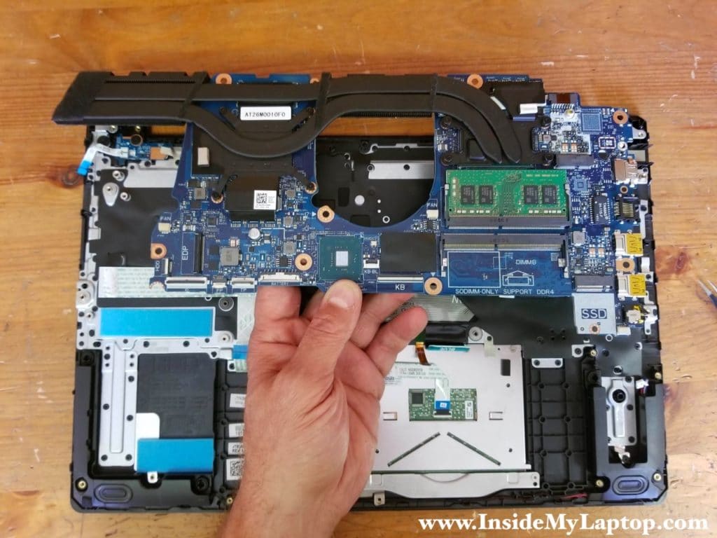 Separate the motherboard from the palmrest assembly and remove it.