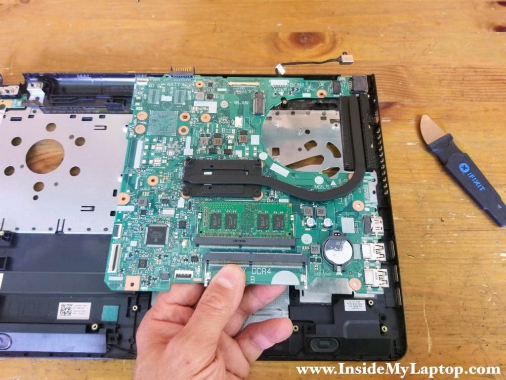 Lift up and remove the motherboard.