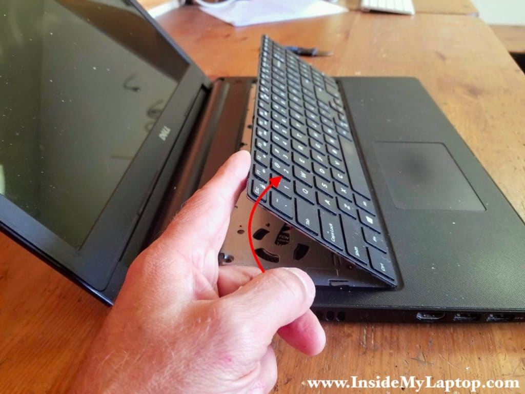 Unlock all five latches and separate the keyboard from the palmrest.