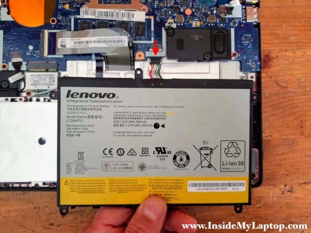 Lift up the battery and disconnect the battery cable from the motherboard.